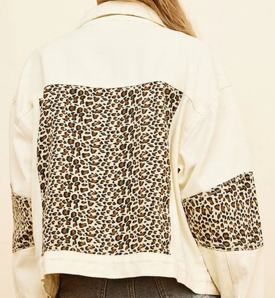 ophisticated look with this Button Up Animal Print Jacket. Back view, in cream.