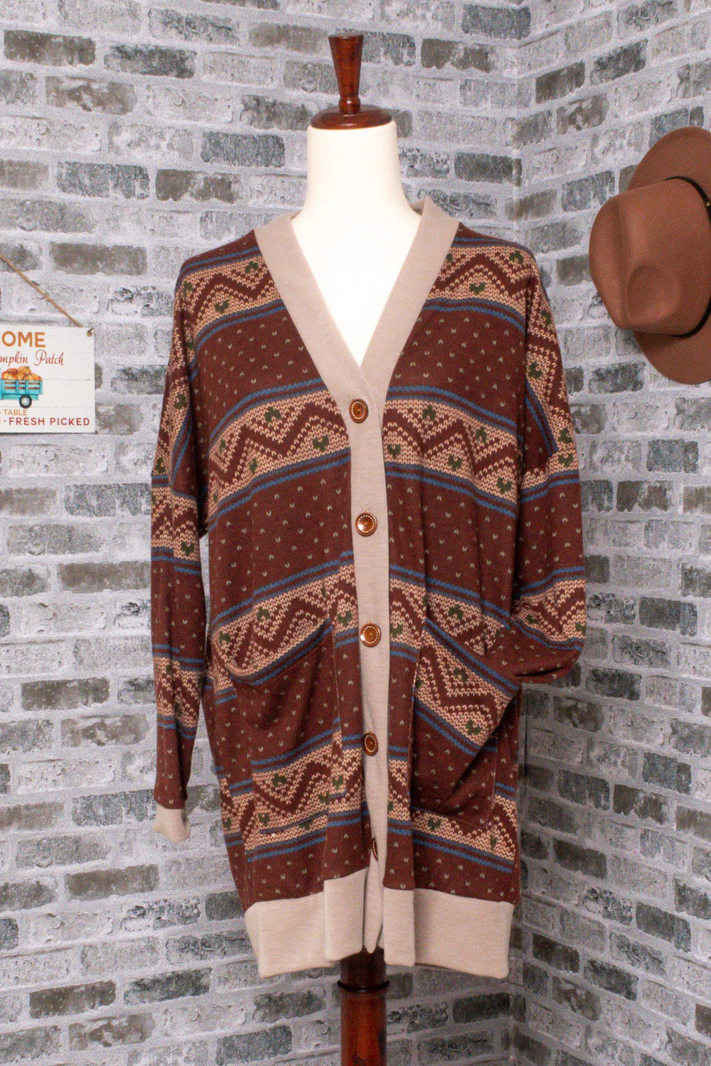 Rust Holiday Tribal Cardigan front view .