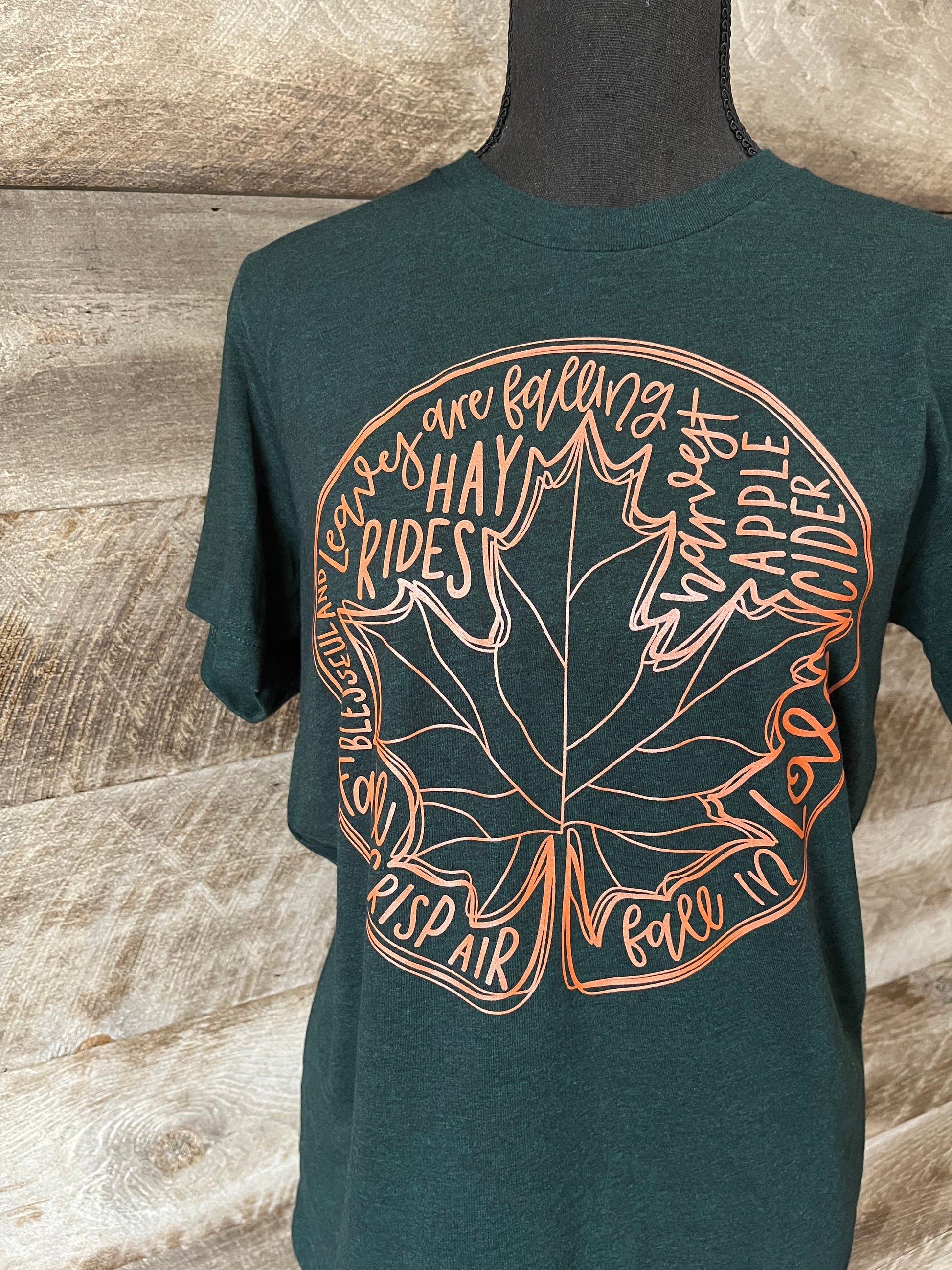 Adult Tee with Large leaf and writing about Fall on the front.