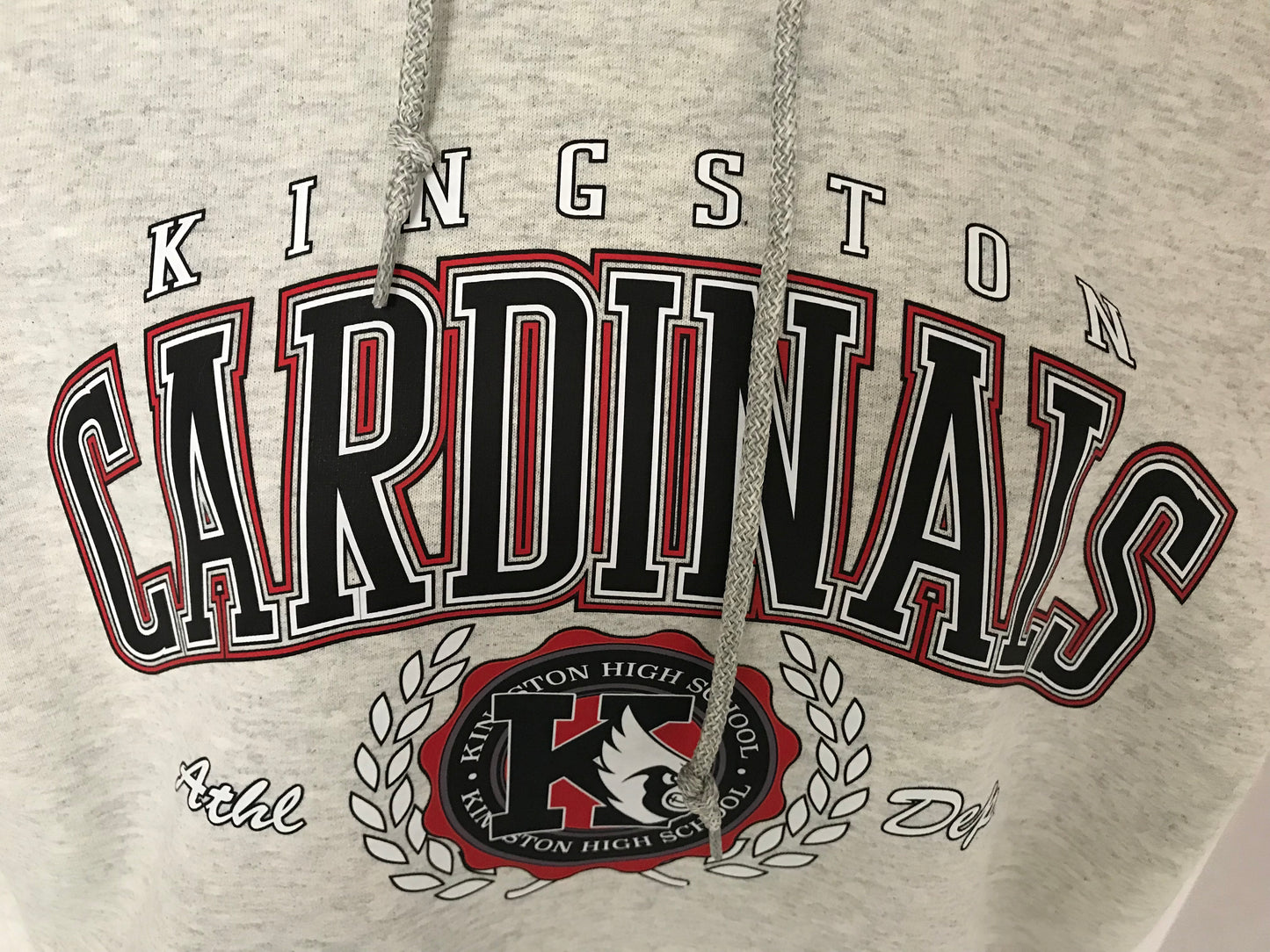 Kingston Cardinal Tee with the words Kingston Cardinals on front and  Athl Dept on front-close up